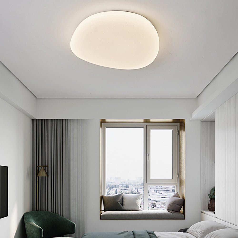 Moderne LED Deckenleuchte in Kieselform Front